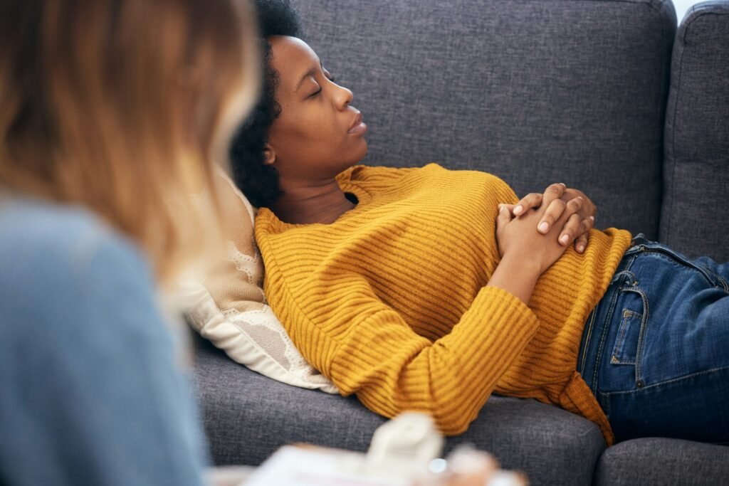 depressed woman lying down