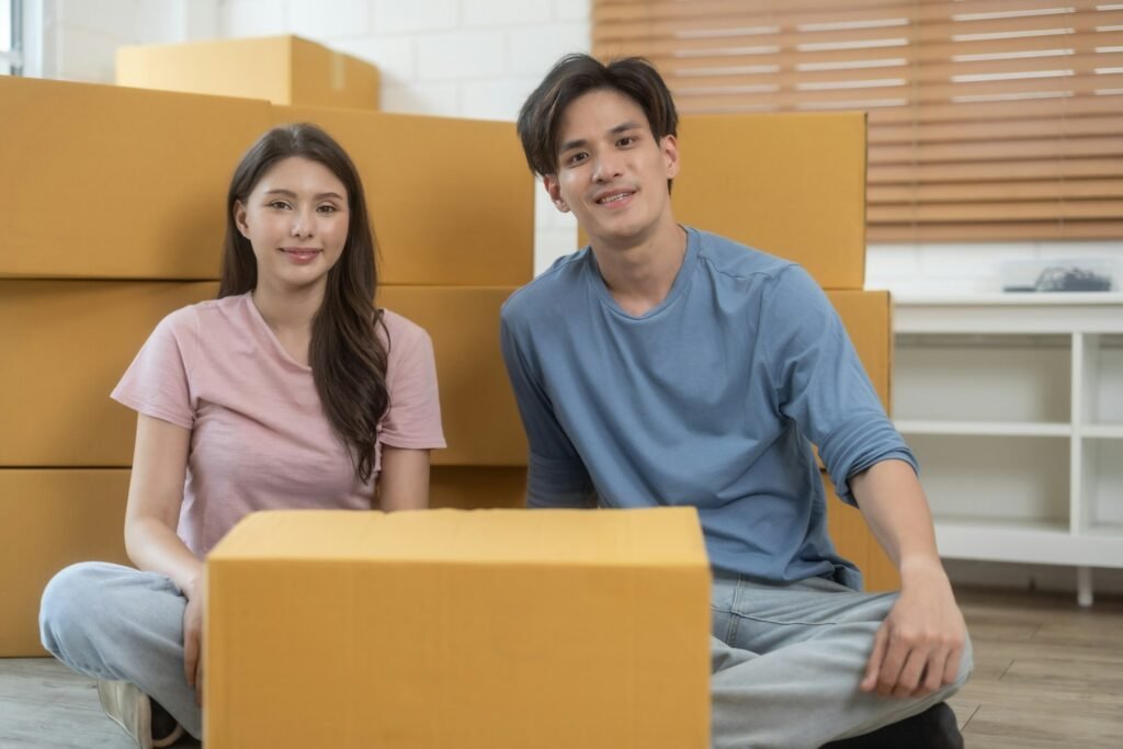 Happy Couple Celebrating Successful Move